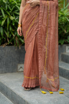 Brown soft organza saree with lime green ikkat blouse