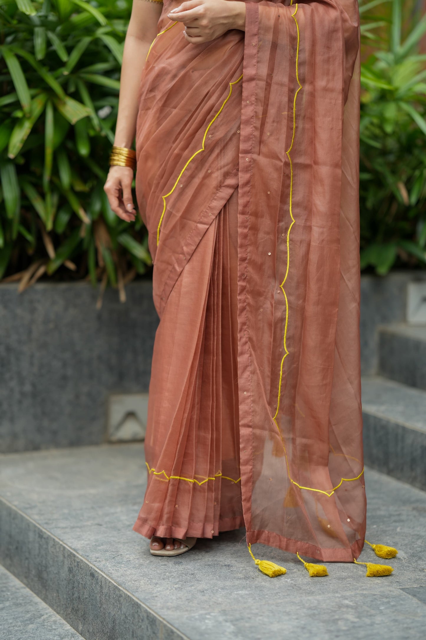 Brown soft organza saree with lime green ikkat blouse
