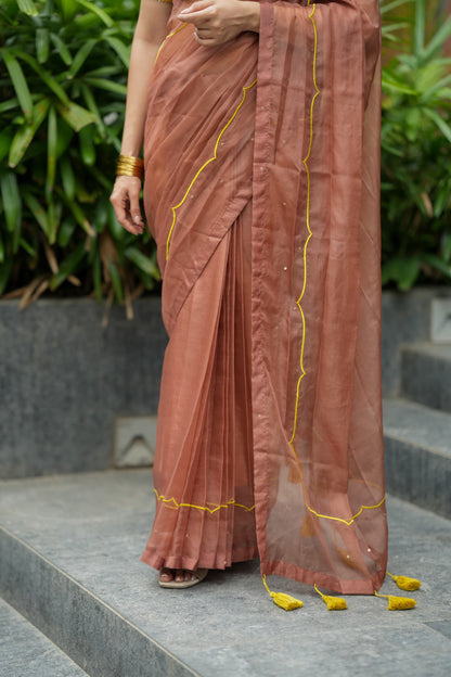 Brown soft organza saree with lime green ikkat blouse