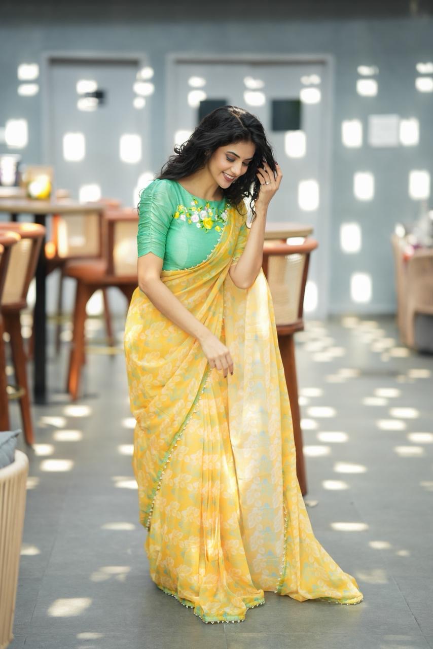 Green tissue floral hand work blouse (only blouse)