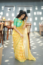 Green tissue floral hand work blouse (only blouse)