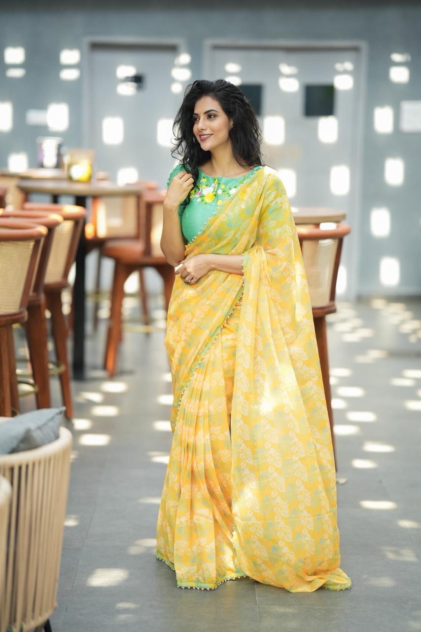 Green tissue floral hand work blouse (only blouse)