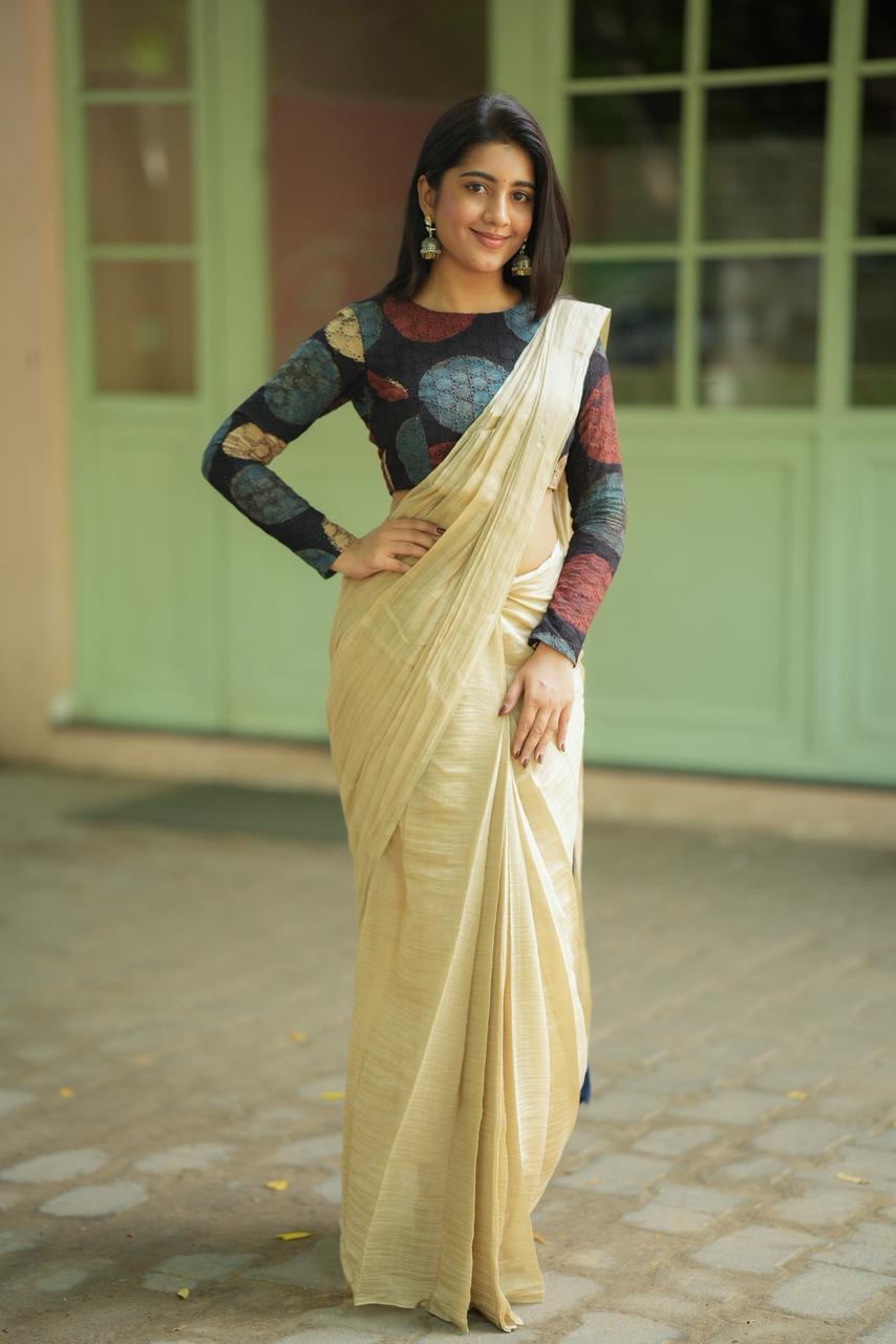 Cream malai chanderi saree with Ajrak handblock print blouse