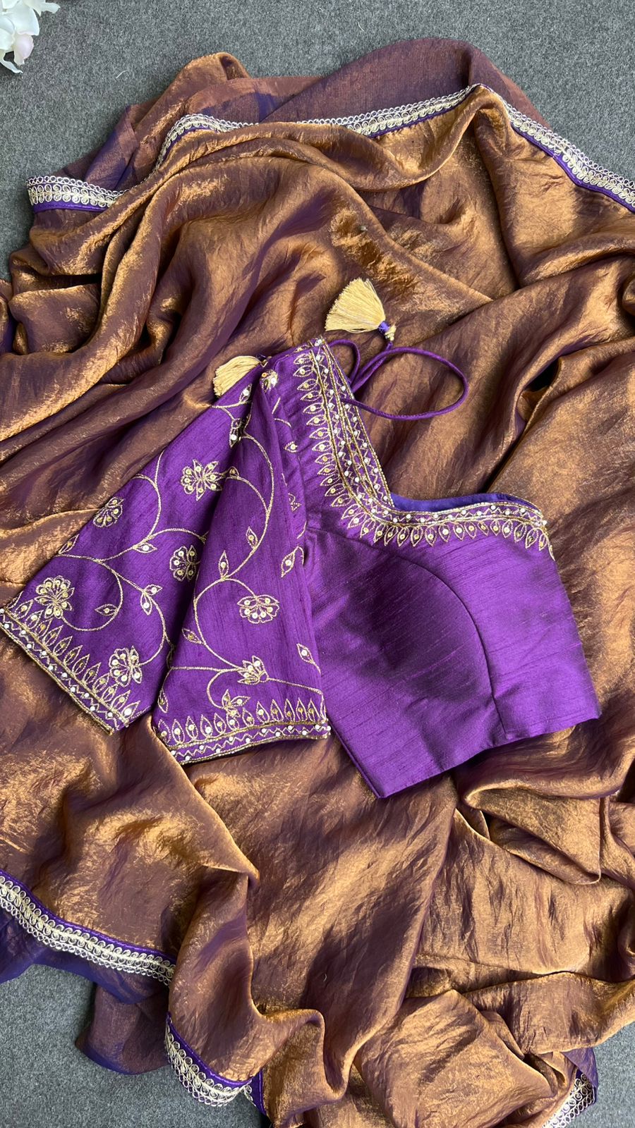 Coffee tissue saree with purple heavy hand work blouse