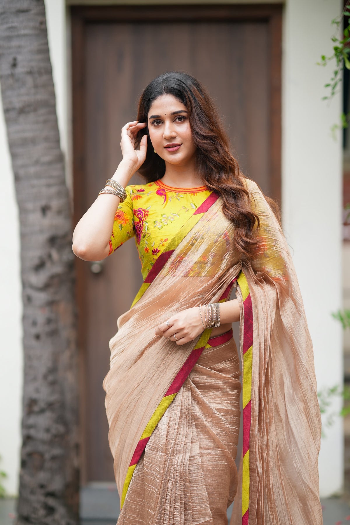 Antique gold tissue saree with parrot handwork blouse
