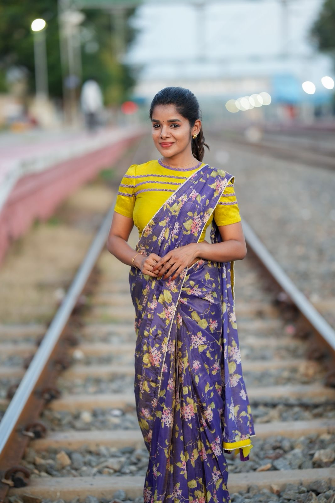 Blue floral tissue saree with lime hand work blouse