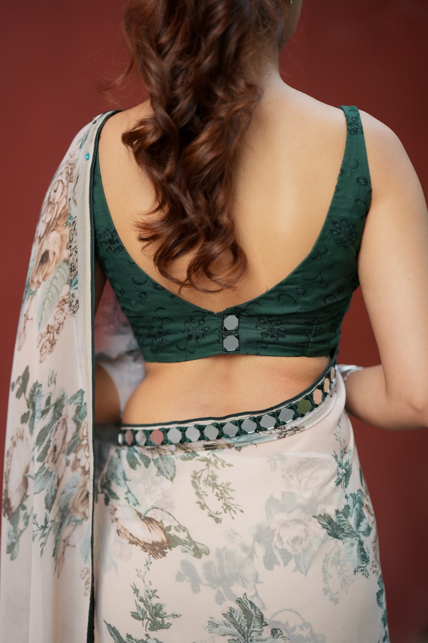 Half white chiffon floral saree with hand work blouse