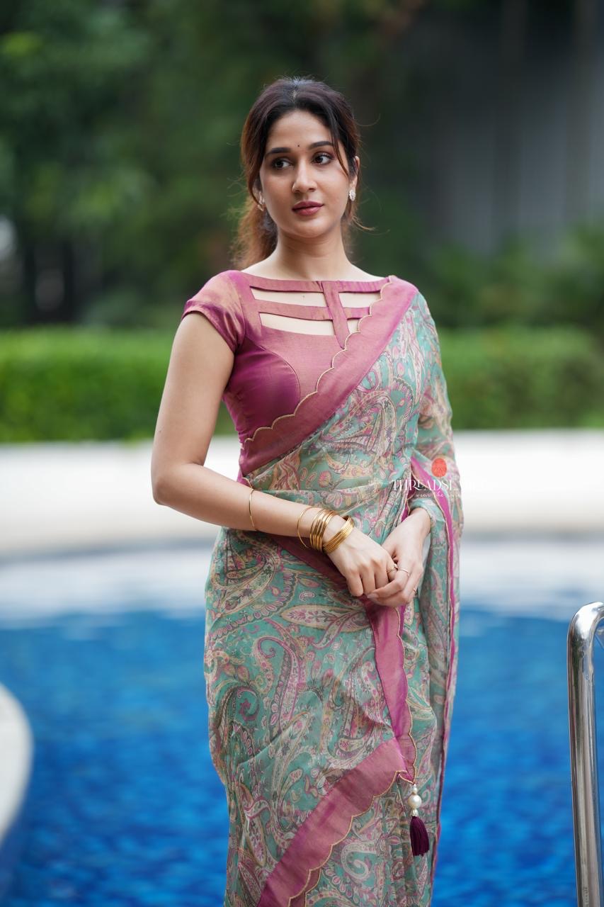 Jade green viscose jute saree with pink tissue blouse