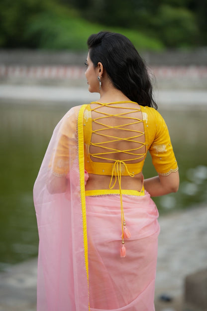 Peach organza saree with yellow hand work blouse