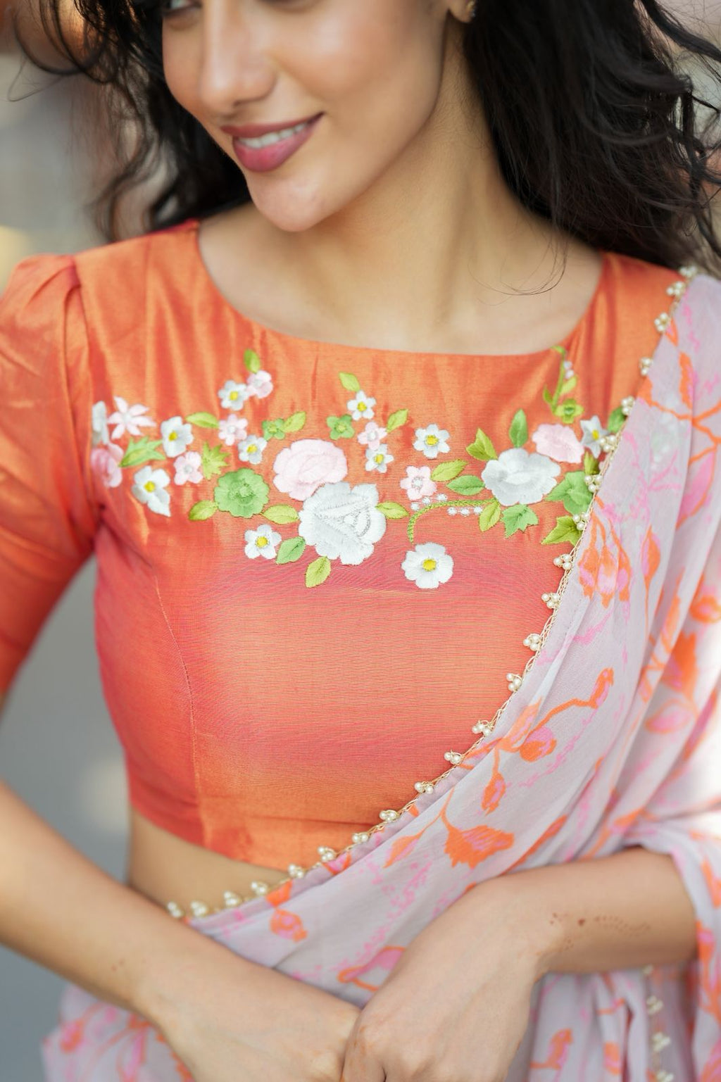 Reddish orange tissue floral hand work blouse(only blouse)