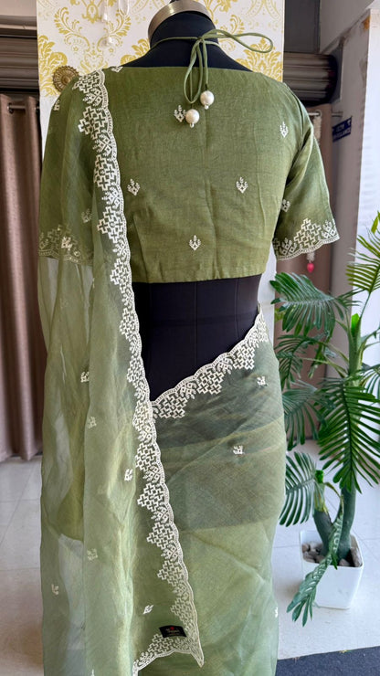 Light green tissue saree with tissue embroidery blouse