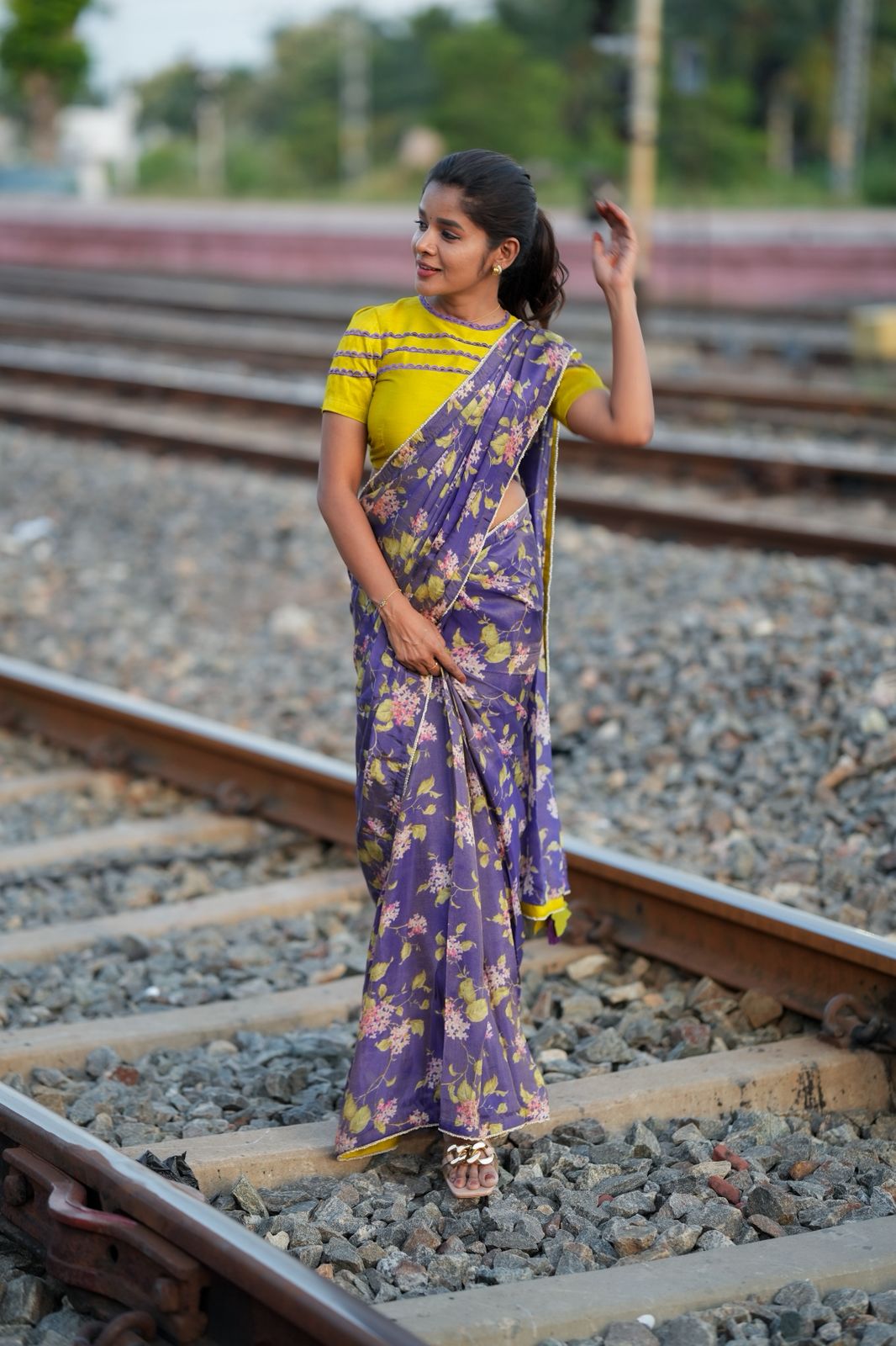 Blue floral tissue saree with lime hand work blouse
