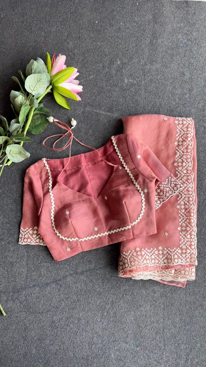 Peach tissue saree with tissue embroidery blouse