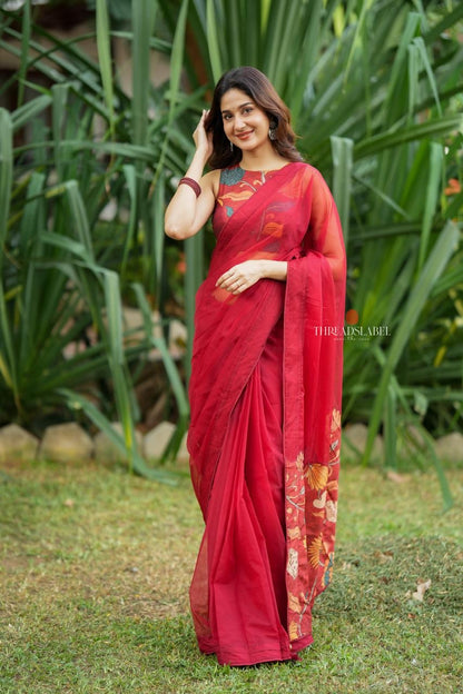 Maroon soft organza saree with kalamkari blouse