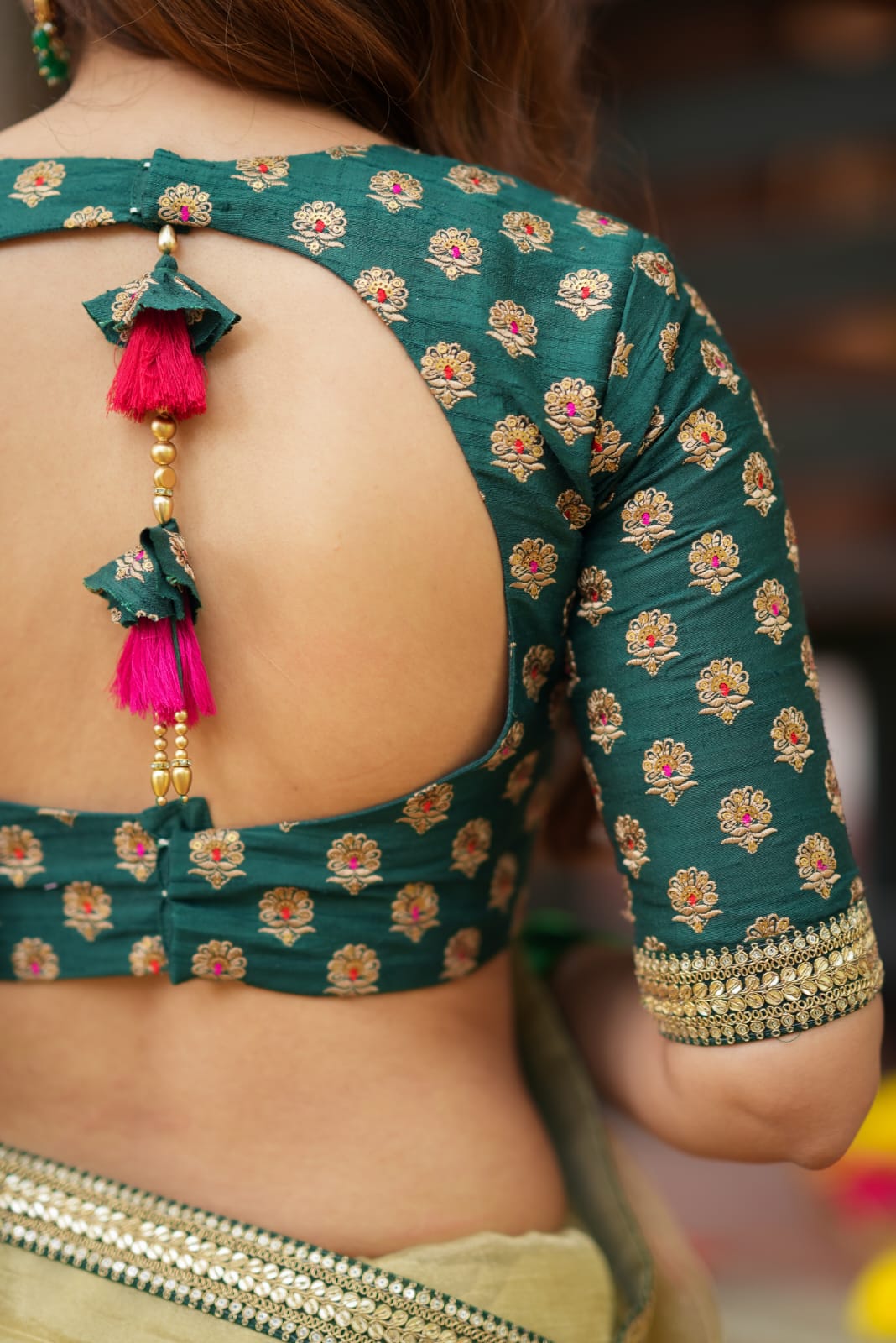 Gold tissue saree with green hand work blouse