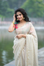 Beige georgette tissue saree with multi hand work blouse