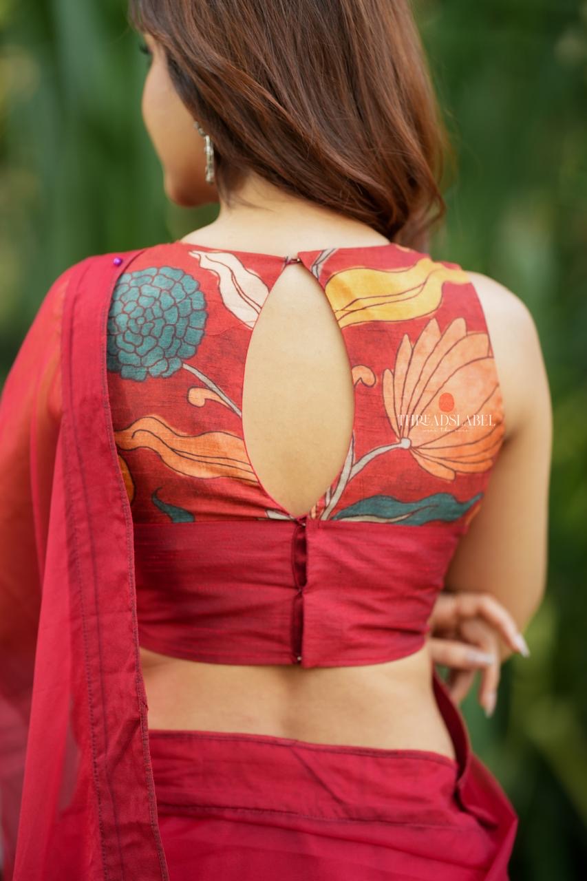 Maroon soft organza saree with kalamkari blouse