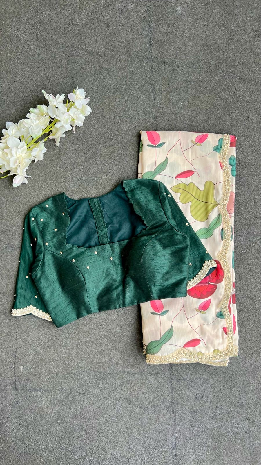 Half white floral kossa saree with green hand worked blouse