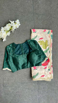 Half white floral kossa saree with green hand worked blouse