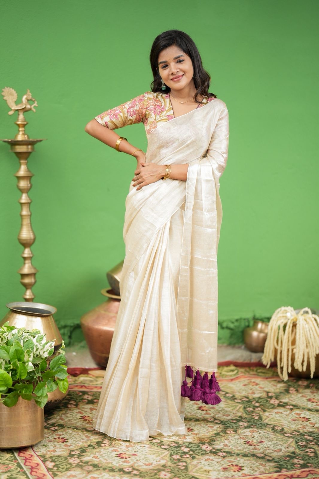 Cream soft tissue saree with embroidered blouse
