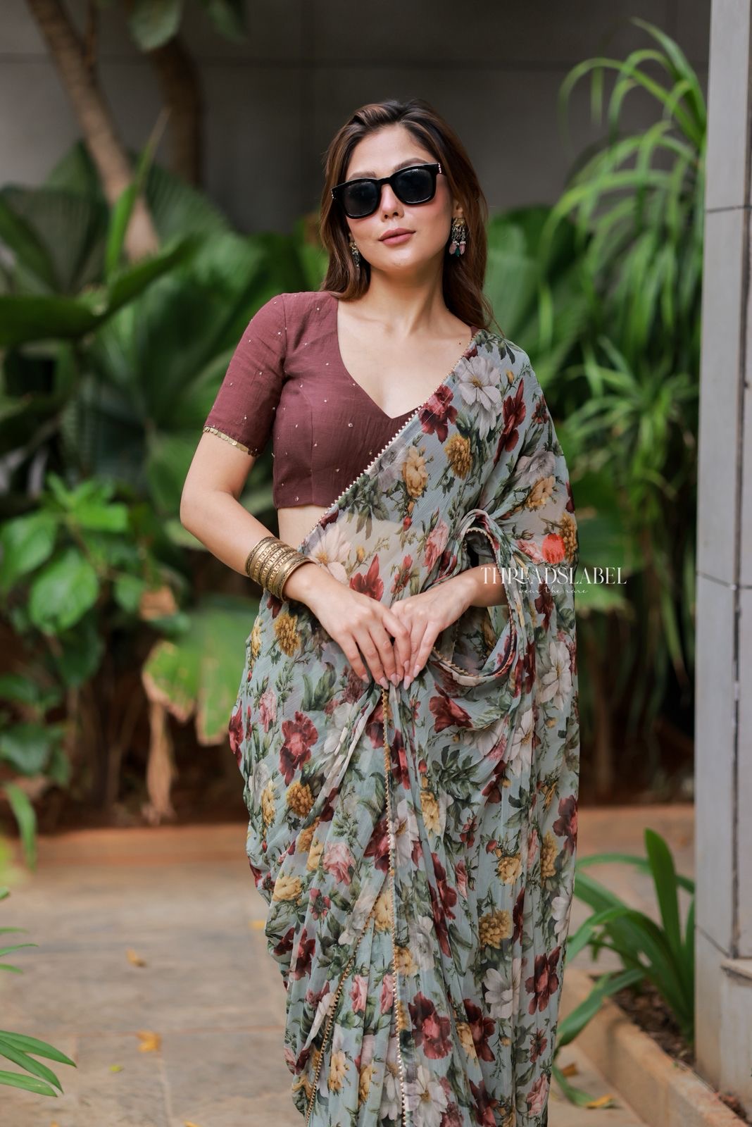 Sage green floral chiffon saree with hand work blouse