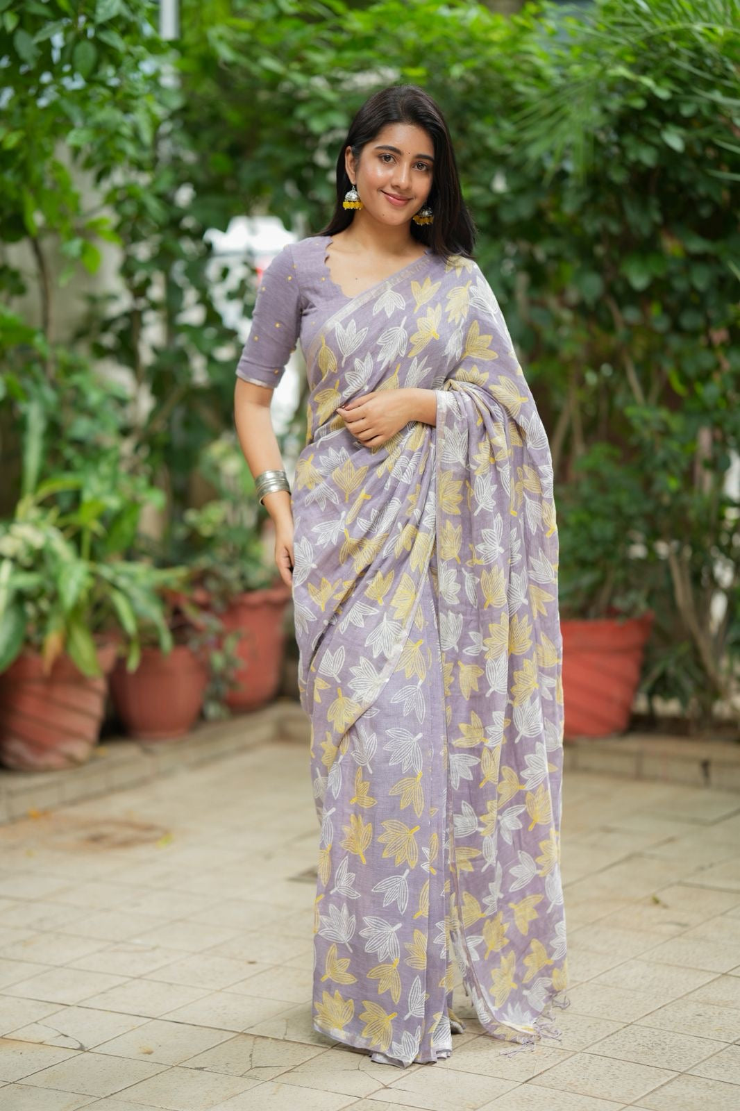 Lavender linen floral saree with hand work blouse