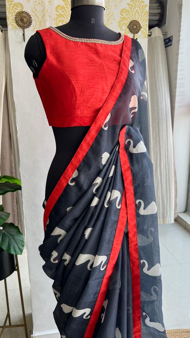 Grey kota doria saree with reddish hand worked blouse