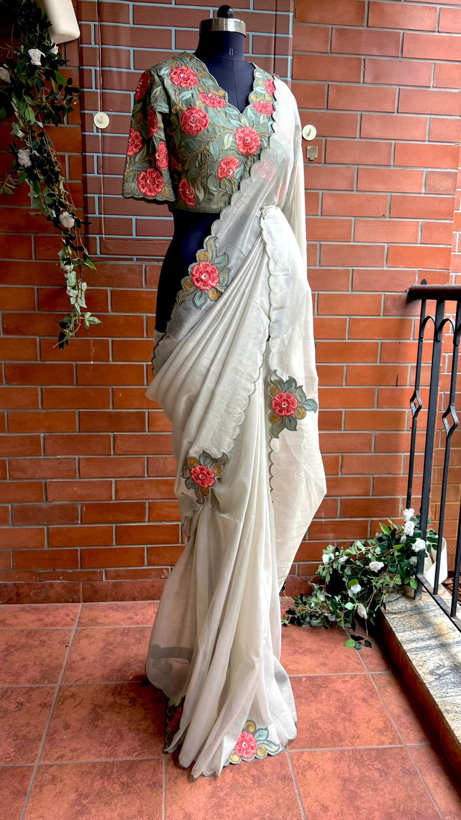 Half white textured organza saree with heavy handwork blouse