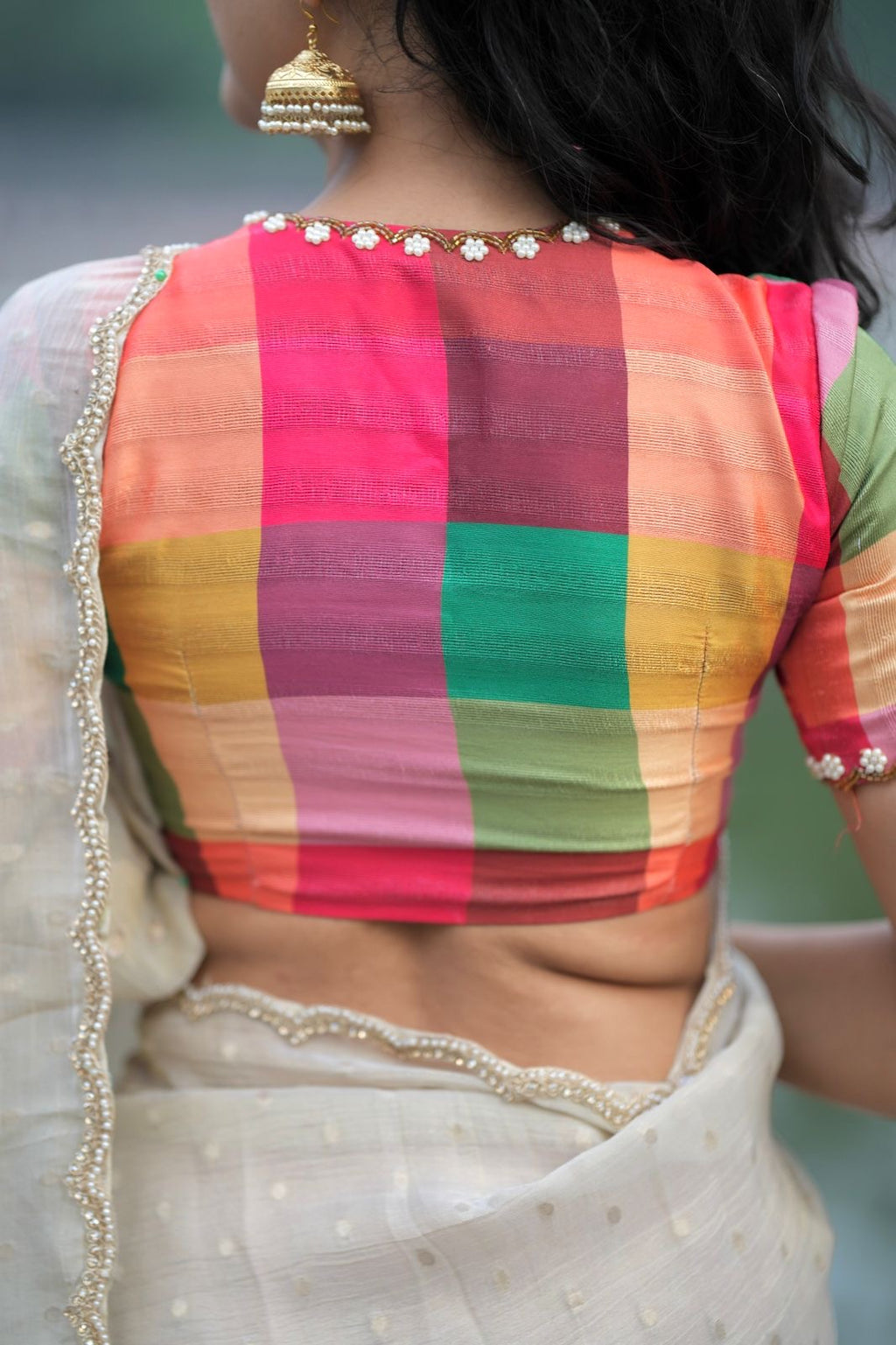 Beige georgette tissue saree with multi hand work blouse