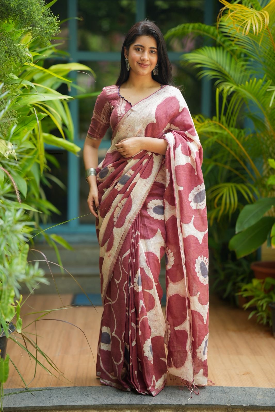 Brown linen floral saree with hand work blouse