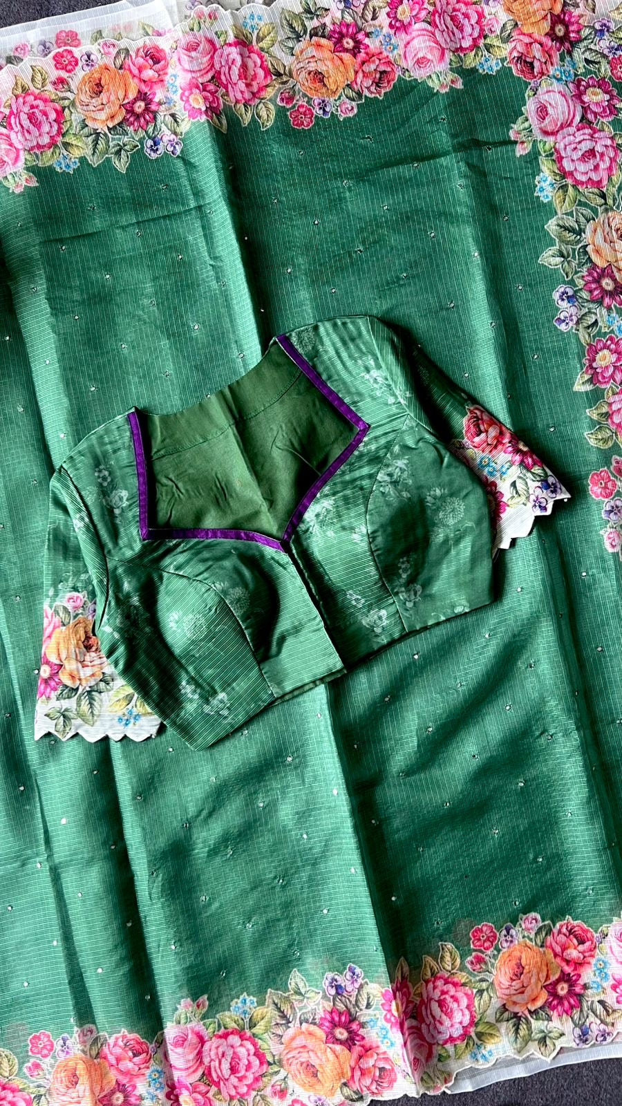 Green floral kota doria saree with patterned blouse