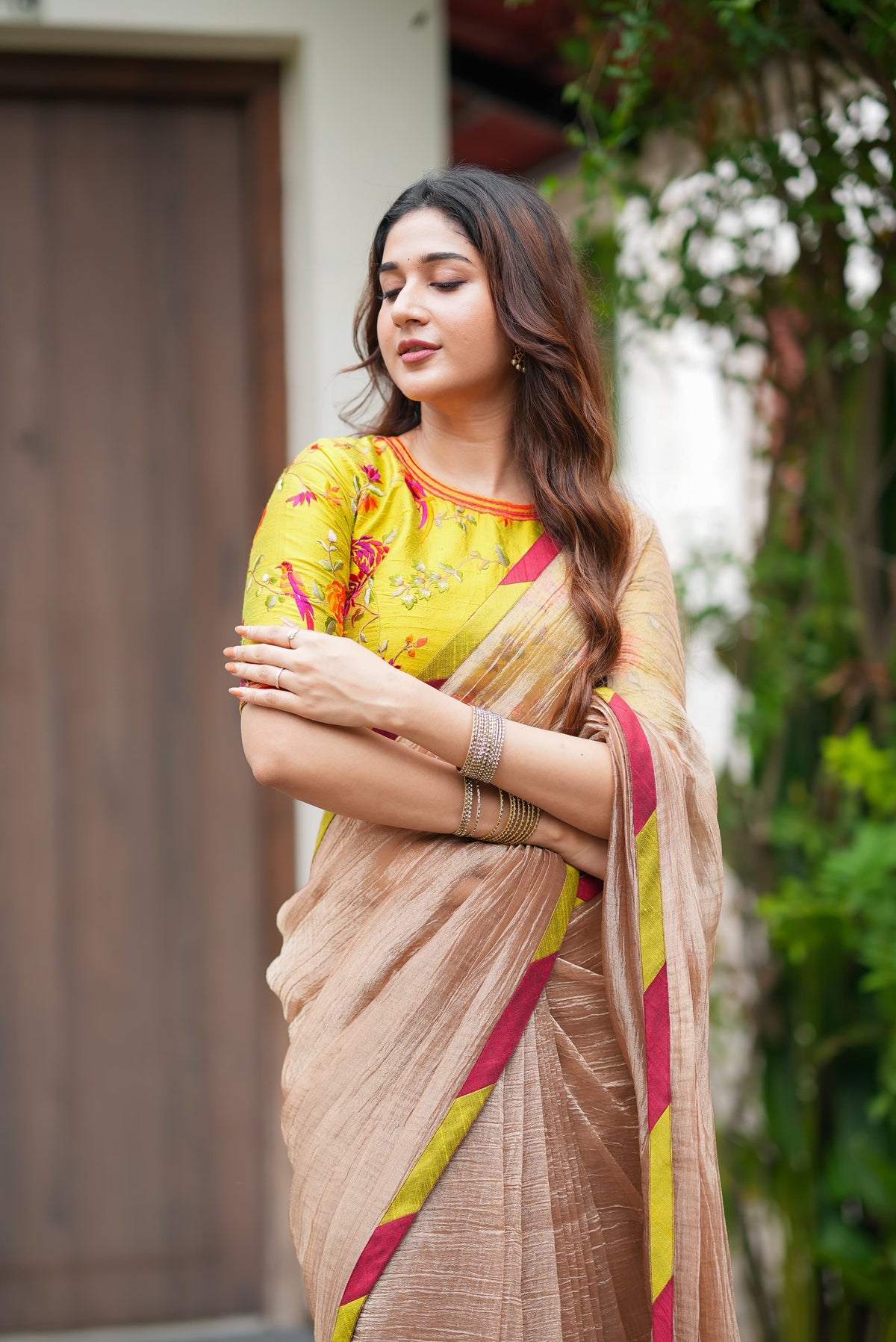 Antique gold tissue saree with parrot handwork blouse