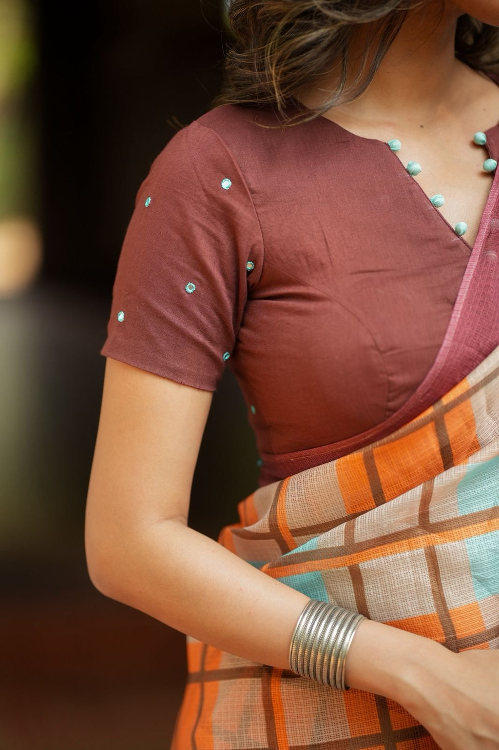 Multi checked kota saree with brown embroidery blouse
