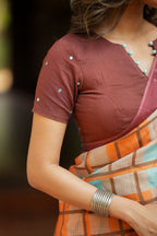 Multi checked kota saree with brown embroidery blouse