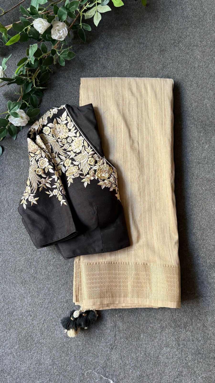 Golden cream tissue saree with black hand work blouse