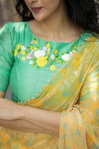 Green tissue floral hand work blouse (only blouse)