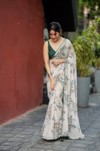 Half white chiffon floral saree with hand work blouse