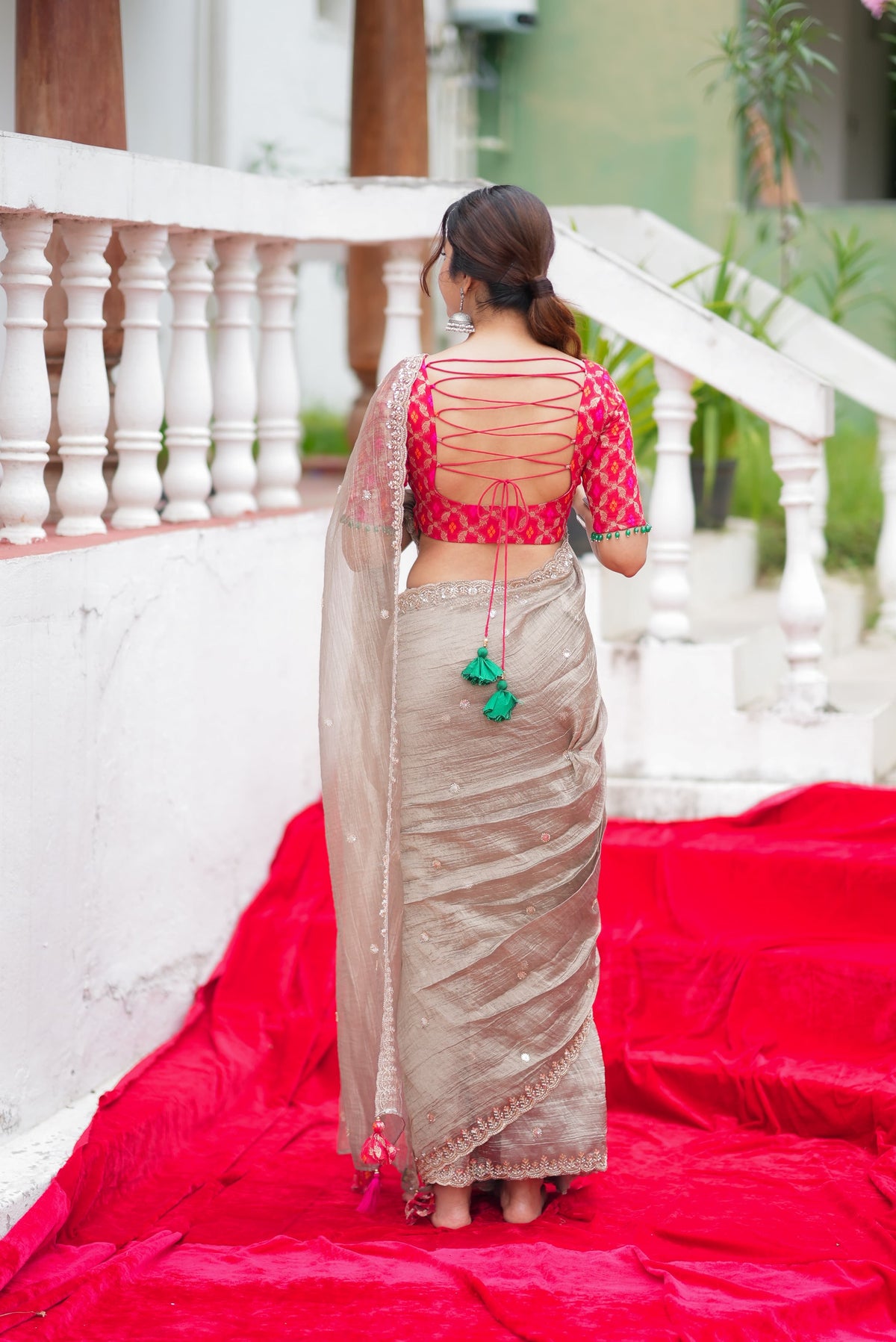 Grey tissue saree with red banarasi blouse