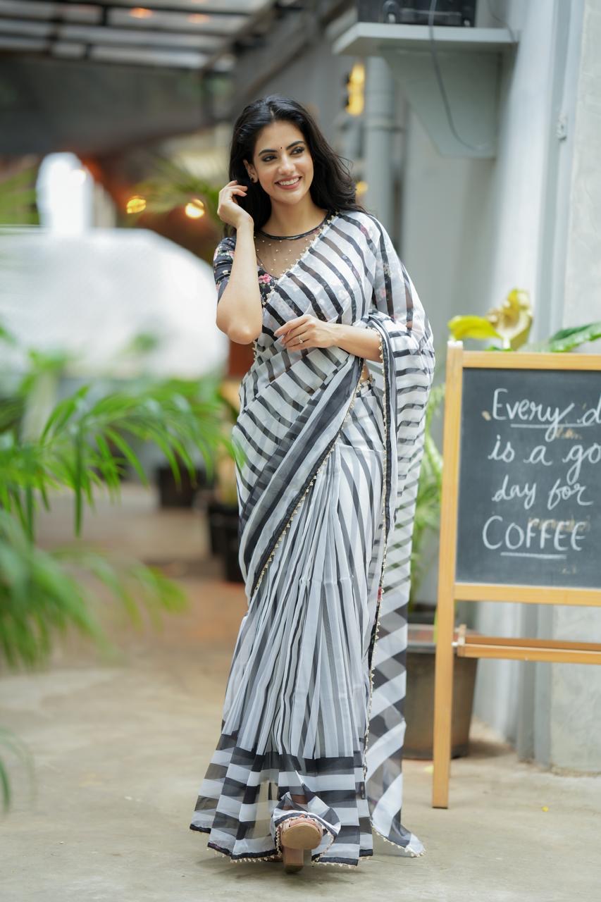 Black & white stripe organza saree with hand work blouse