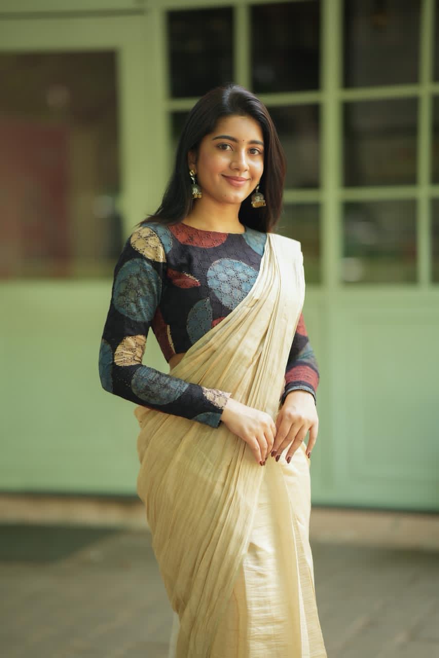 Cream malai chanderi saree with Ajrak handblock print blouse