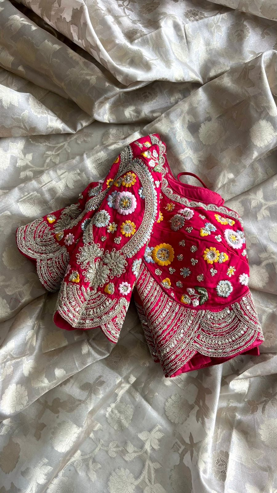 Half white banarasi saree with deep pink silk hand embroidery blouse