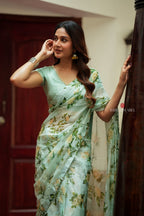 Sea green viscose jute floral saree (only saree)
