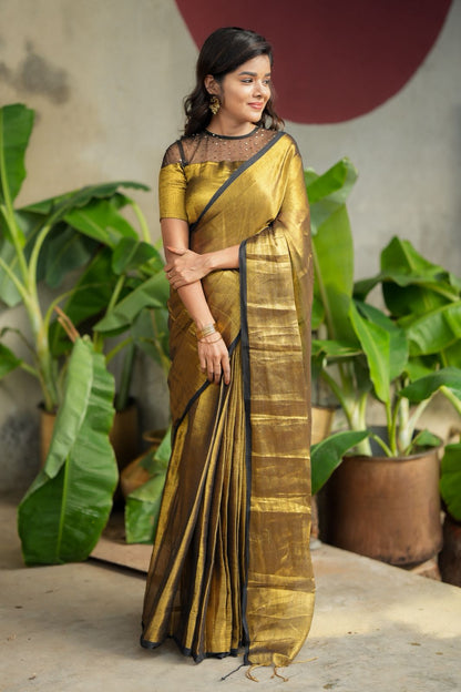 Golden soft tissue saree with hand work blouse