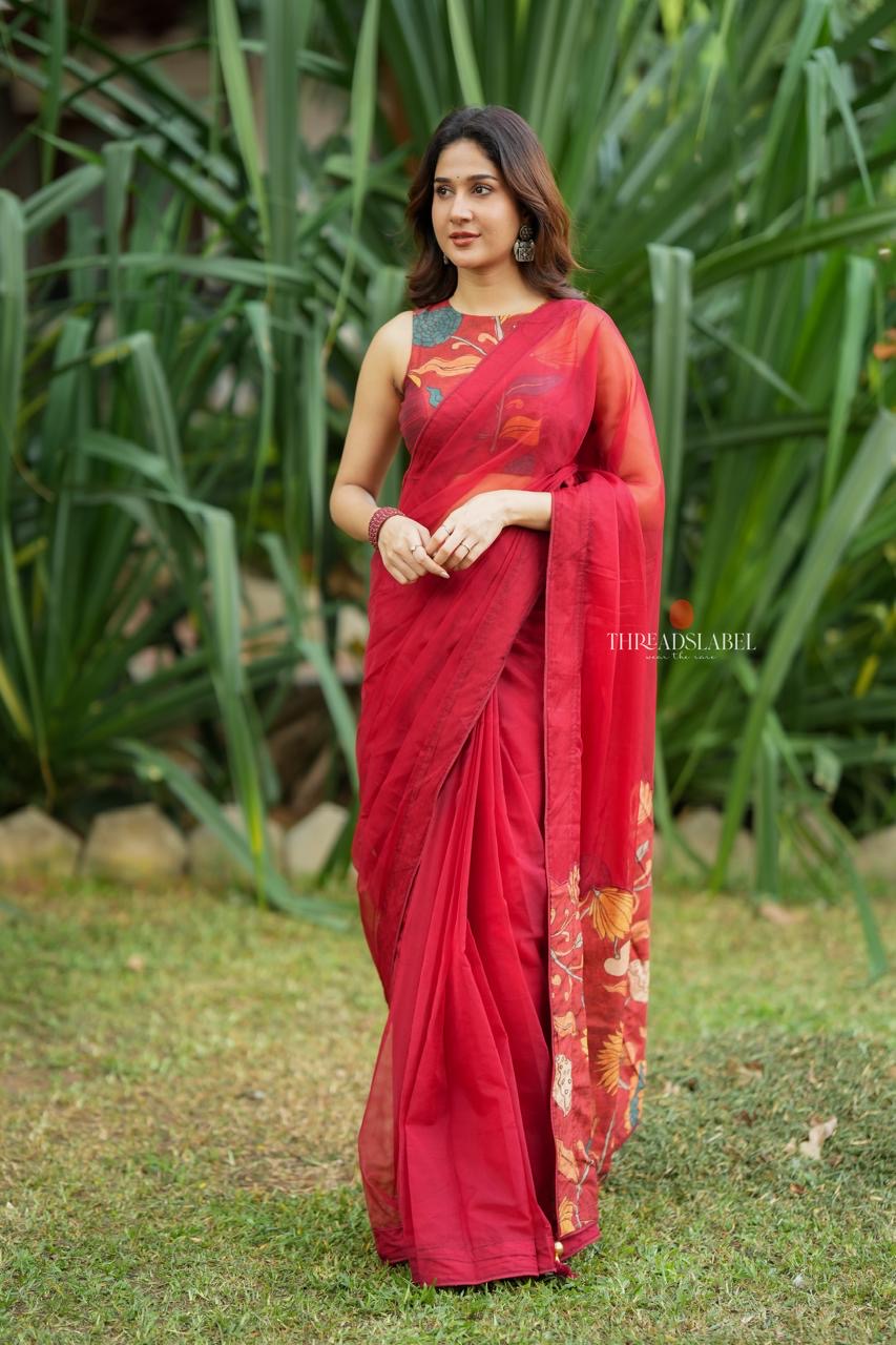 Maroon soft organza saree with kalamkari blouse