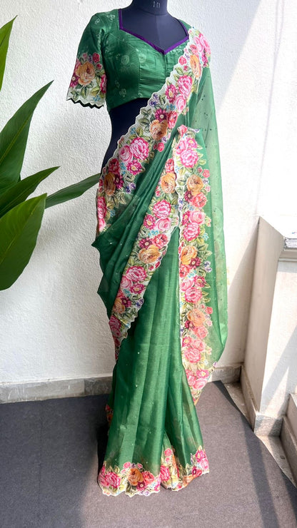 Green floral kota doria saree with patterned blouse