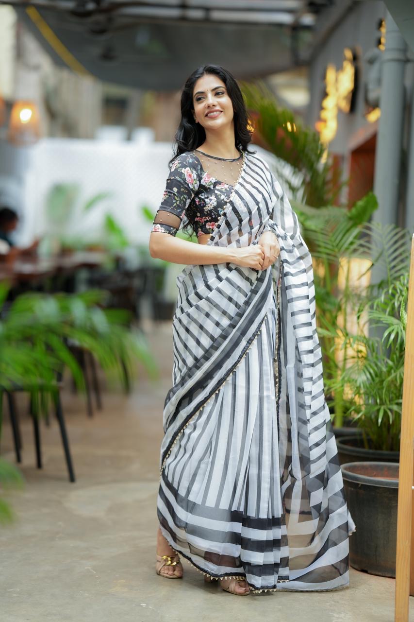 Black & white stripe organza saree with hand work blouse