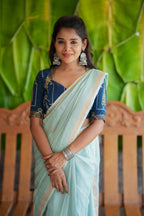 Aqua blue kota doria saree with hand work blouse