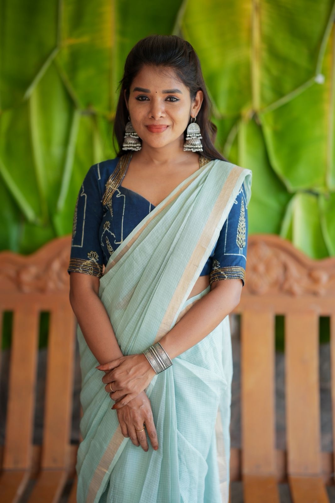 Aqua blue kota doria saree with hand work blouse