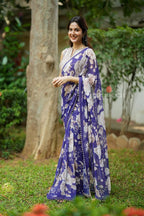 Purple chiffon floral saree with hand work blouse