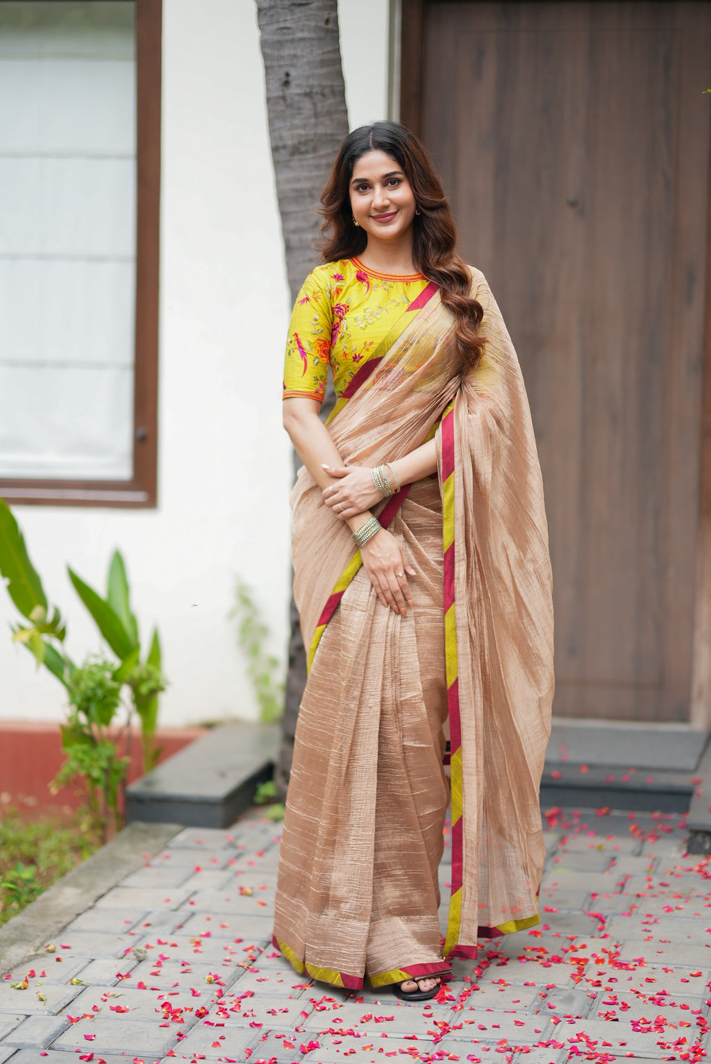 Antique gold tissue saree with parrot handwork blouse